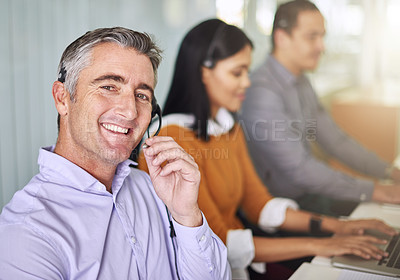 Buy stock photo Cropped portrait of a man working at his desk