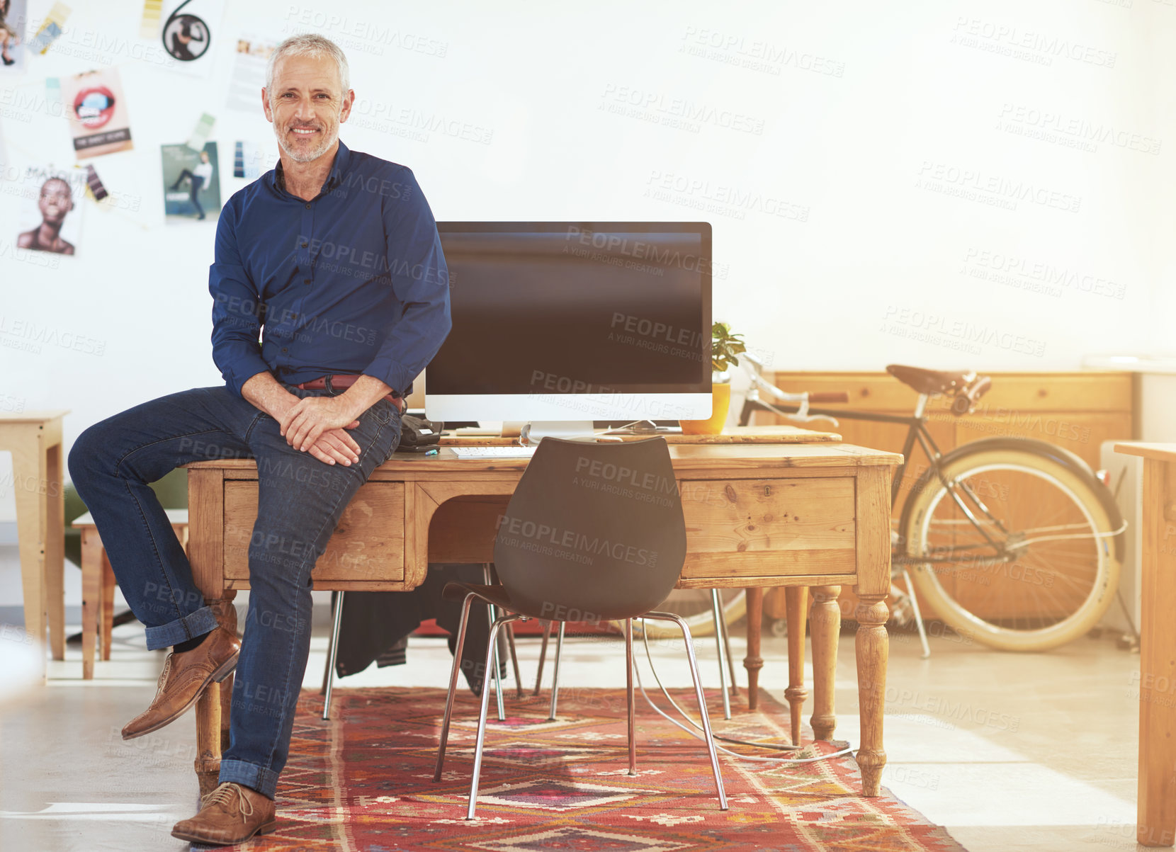 Buy stock photo Portrait of a mature male designer in his modern office