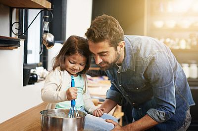 Buy stock photo Cooking, food and father with daughter in kitchen for pancakes, bonding and learning. Breakfast, morning and helping with man and young girl in family home for baking, support and teaching nutrition