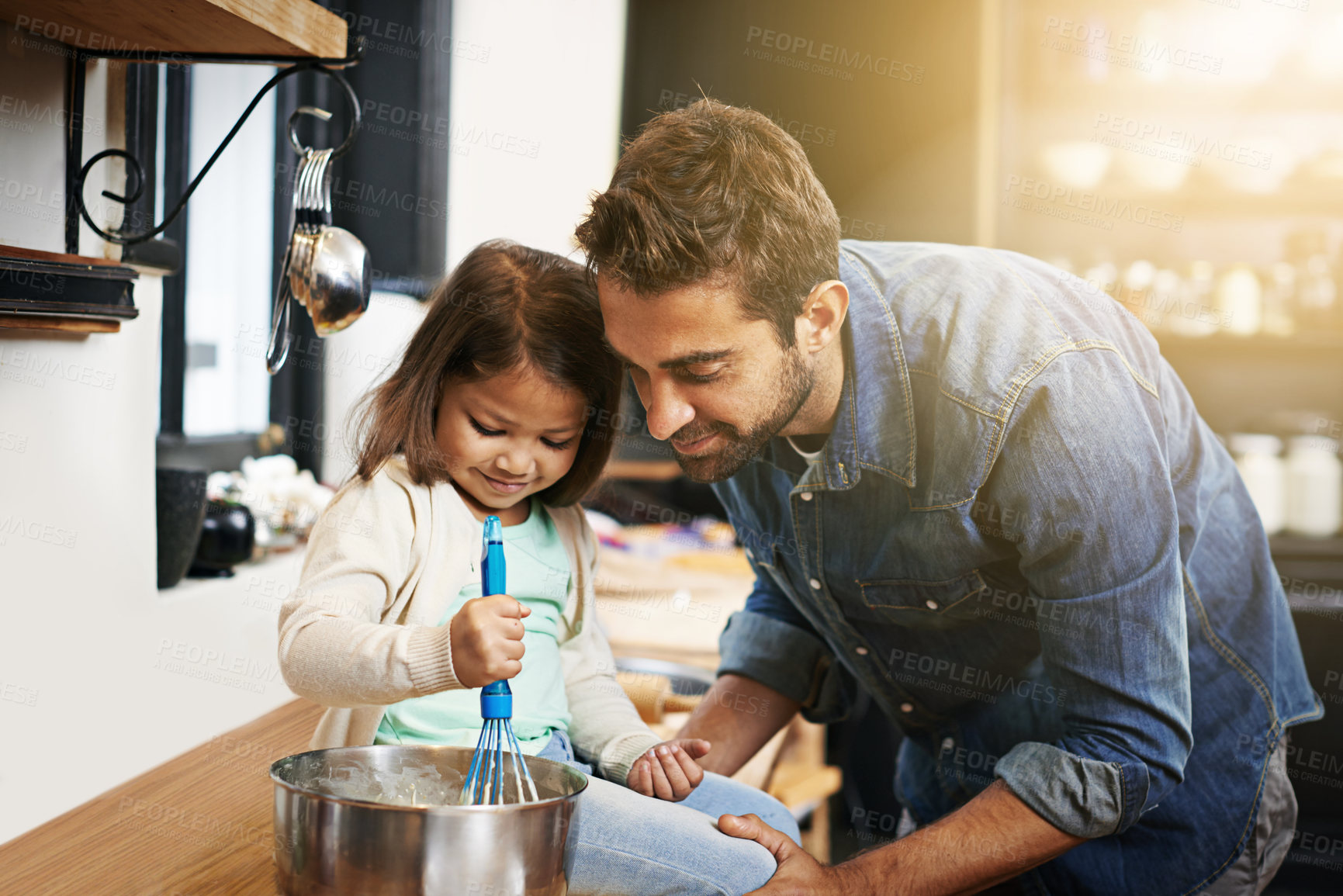 Buy stock photo Cooking, food and father with daughter in kitchen for pancakes, bonding and learning. Breakfast, morning and helping with man and young girl in family home for baking, support and teaching nutrition