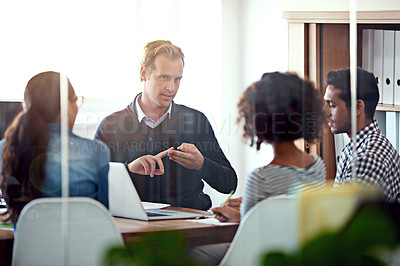 Buy stock photo Cropped shot of four designers in a business meeting