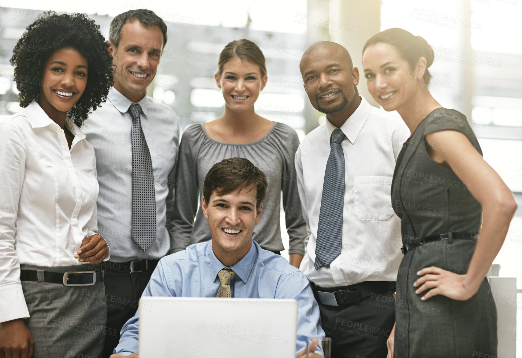 Buy stock photo Portrait, laptop and a group of business people working together in collaboration on a project in their office. Teamwork, computer and corporate with an employee meeting in the boardroom for planning