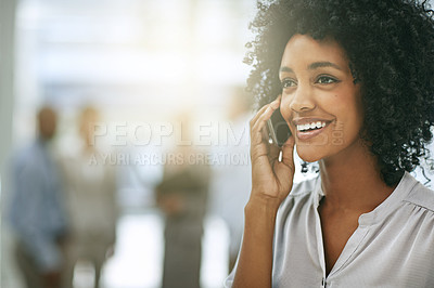 Buy stock photo Cropped shot of a young businesswoman using making a call with her colleagues in the background