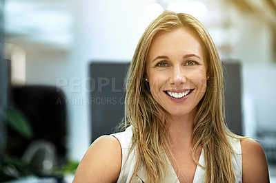 Buy stock photo Cropped portrait of a businesswoman sitting in her office