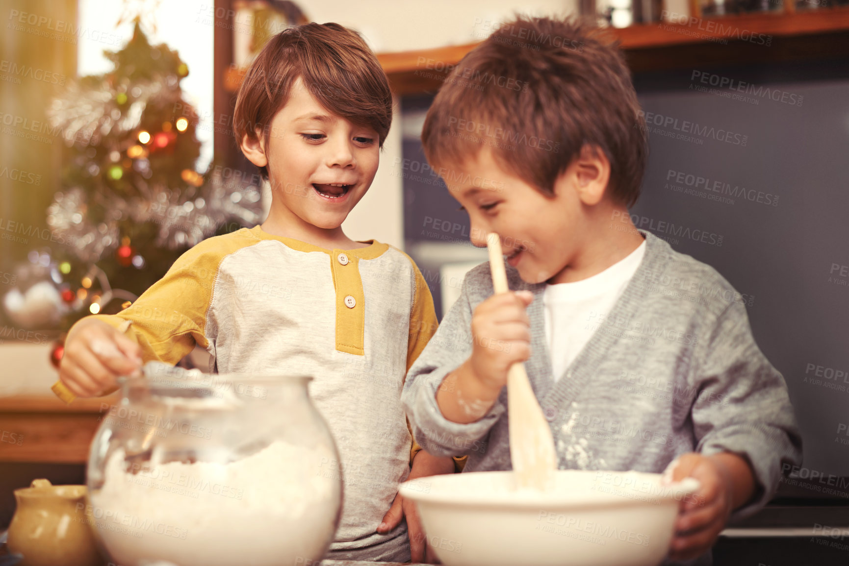 Buy stock photo Boys, baking and happy in kitchen with flour, home and learning with ingredients for christmas cake. Children, mixing or bowl for cookies on counter, biscuits or pastry recipe for holiday celebration
