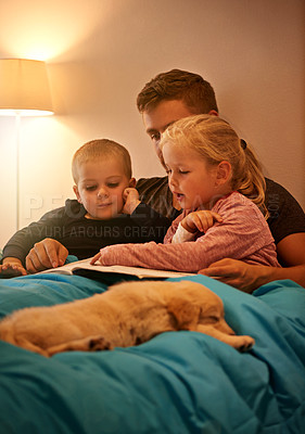 Buy stock photo Books, night or father with kids in bed for reading, learning and bonding with dog at home Love, family and dad with children in bedroom for storytelling, fantasy or literature for teaching pet care