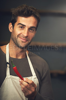 Buy stock photo Chef, chilli and portrait of man in kitchen with vegetables for vegetarian, healthy diet or vegan ingredients. Cooking, male cook holding hot pepper and food for spices from Canada in home or house.