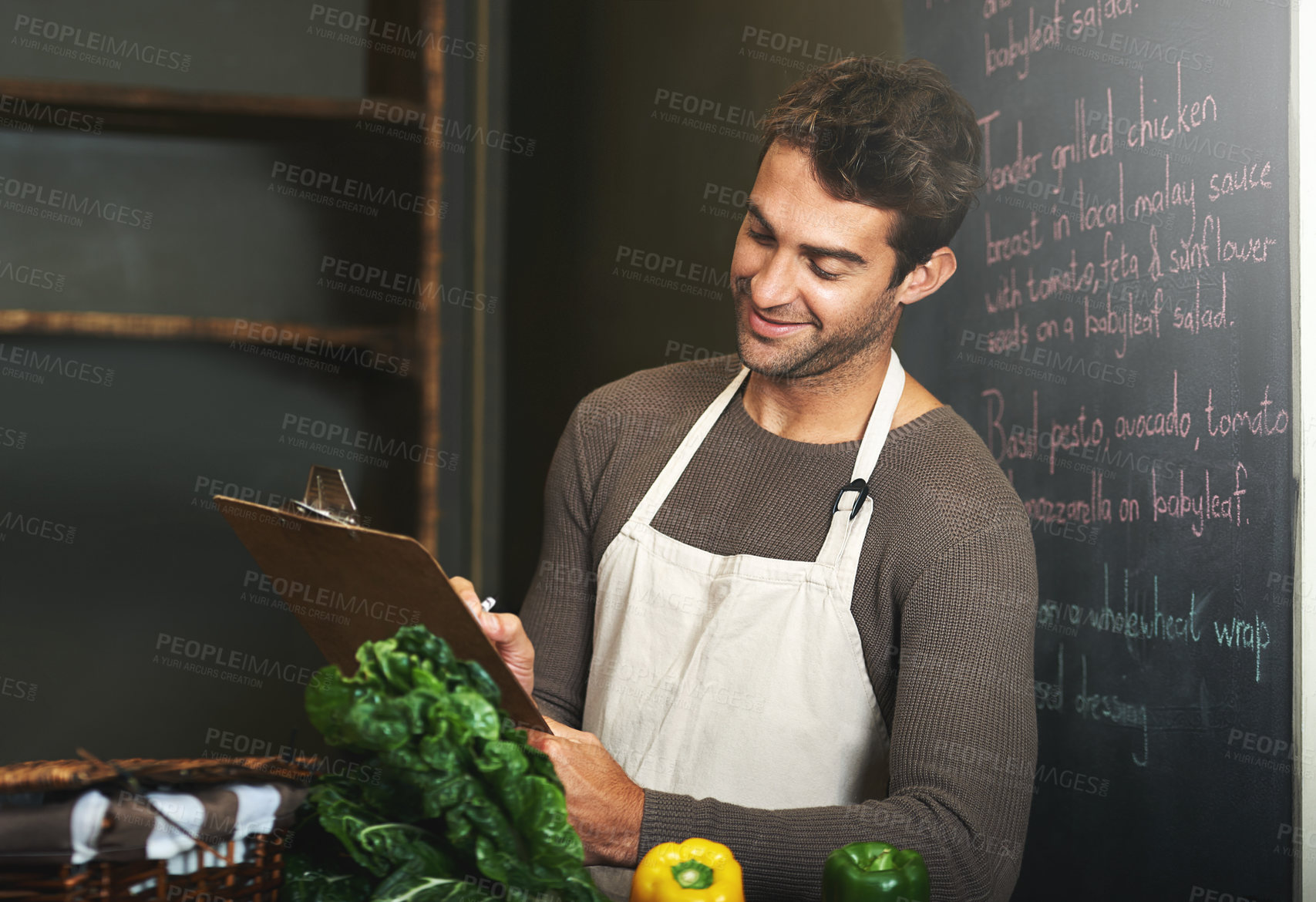 Buy stock photo Kitchen, restaurant and man with clipboard for cooking, service and chef skills for supper. Fine dining, cafe and person with notes, paper and write for stock, inventory and ingredients for meal prep