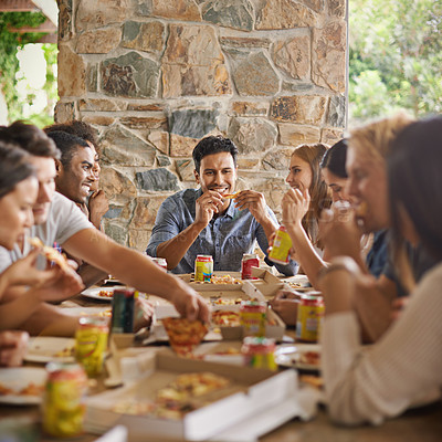 Buy stock photo Friends, happiness and eating of pizza in home with talking, soda and social gathering for bonding in dining room. Men, women and fast food with smile, drinks or diversity at table in lounge of house
