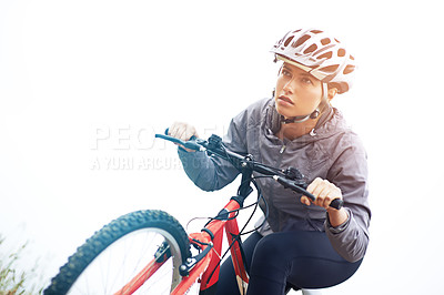 Buy stock photo Woman, bike and nature with cycling, workout and fitness for health and wellness or speed. Athlete, ride and exercise for training, transportation and adventure with helmet and cardio or perseverance