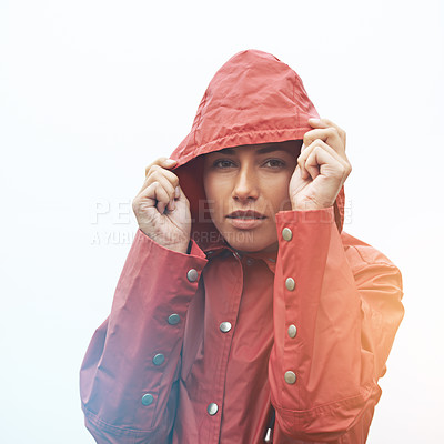 Buy stock photo Woman, portrait and raincoat with hood for weather, cloudy sky or winter season in outdoor storm. Face of female person or model with red waterproof rain jacket for cold overcast or fog on mockup