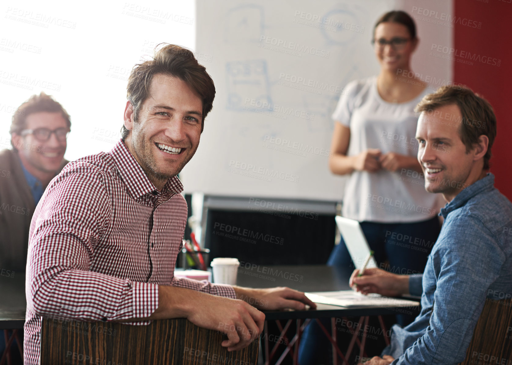 Buy stock photo Portrait of a group of colleagues having a meeting in a boardroom