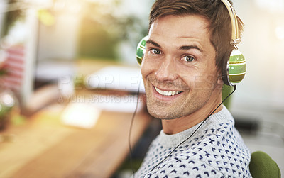 Buy stock photo Portrait, office and headphone for happy male worker, music or podcast for entertainment. Smile, employee and listening or working at workspace in Holland, startup or entrepreneur for tech company
