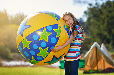 Buy stock photo Portrait of a teenage girl holding a huge inflatable ball outdoors