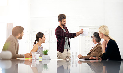 Buy stock photo Shot of a group of coworkers in an office meeting