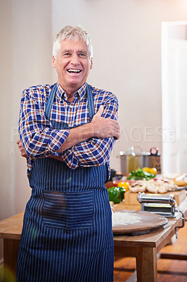 Buy stock photo Portrait shot of a senior man standing in front of the dinner table