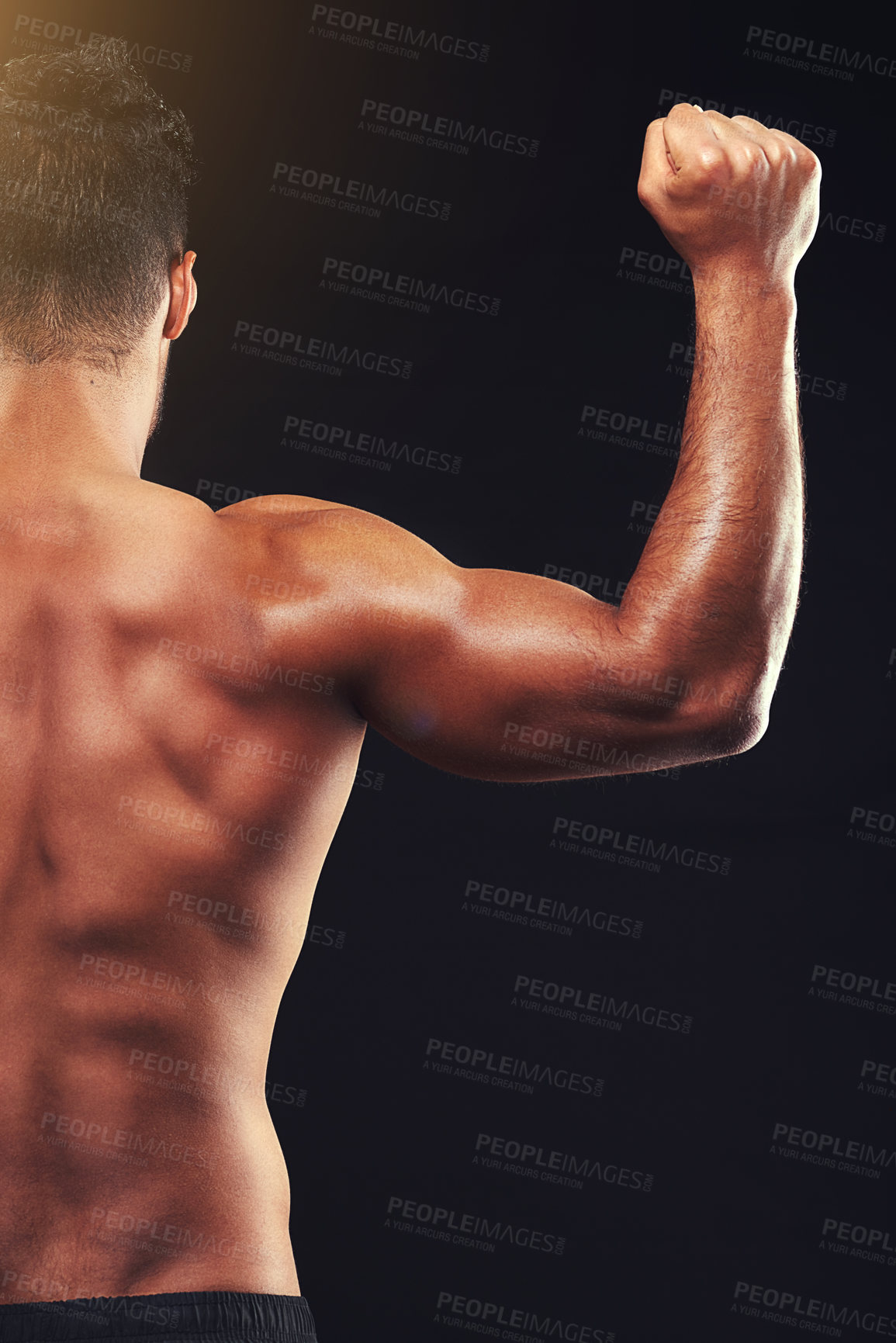 Buy stock photo Bodybuilder, back and man in studio with bicep, flex and workout routine for health, wellness and power. Strong, ripped athlete and fitness on black background for exercise, results and muscular body