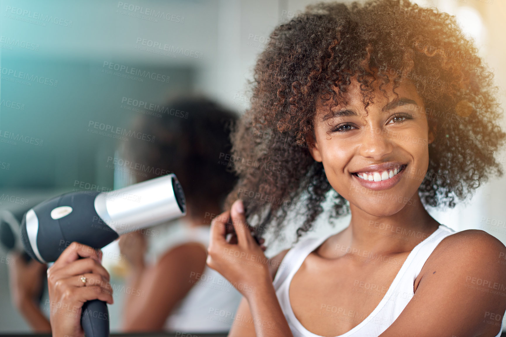Buy stock photo Black woman, hairdryer and hair with texture in portrait, curly hairstyle or frizz for morning routine in bathroom. Natural beauty, haircare and heat treatment for growth, shine and cosmetics at home