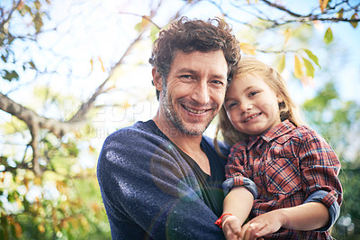Buy stock photo Happy, smile and portrait of father and daughter in backyard garden for hugging, bonding or affectionate. Happiness, relax and excited with man and young girl in outdoors for embrace, autumn and care