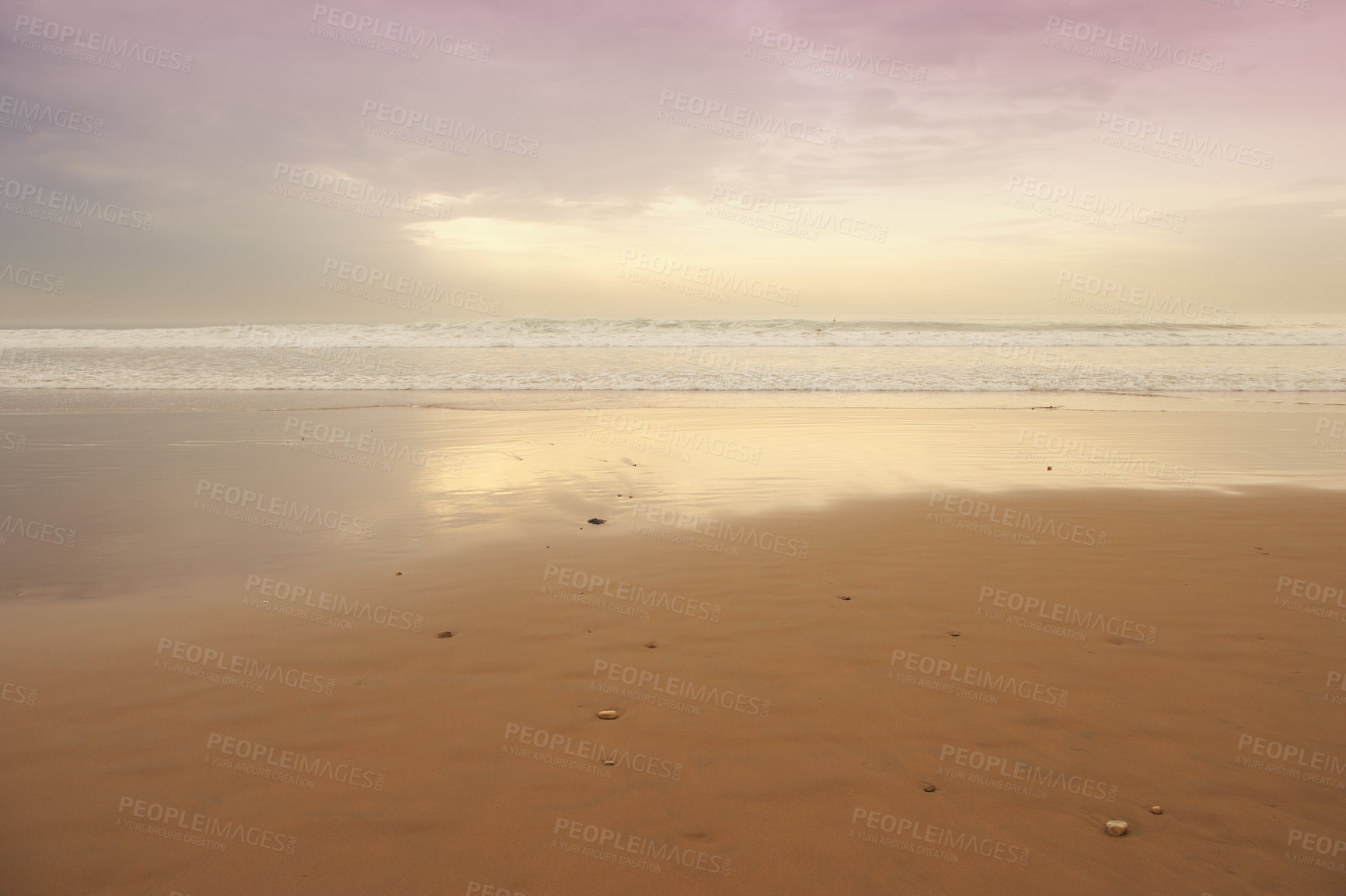 Buy stock photo Seascape and landscape of a golden sunset on the west coast of Jutland in Loekken, Denmark. Beautiful cloudscape on an empty beach at dusk. Clouds over the ocean and sea in the evening with copyspace