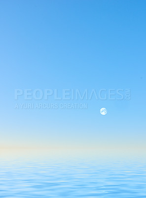 Buy stock photo Seascape of blue ocean water on the west coast of Jutland in Loekken, Denmark. Moon rising over the horizon on an empty sea at dusk in the evening with copyspace. Scenic view of calm, harmony and zen