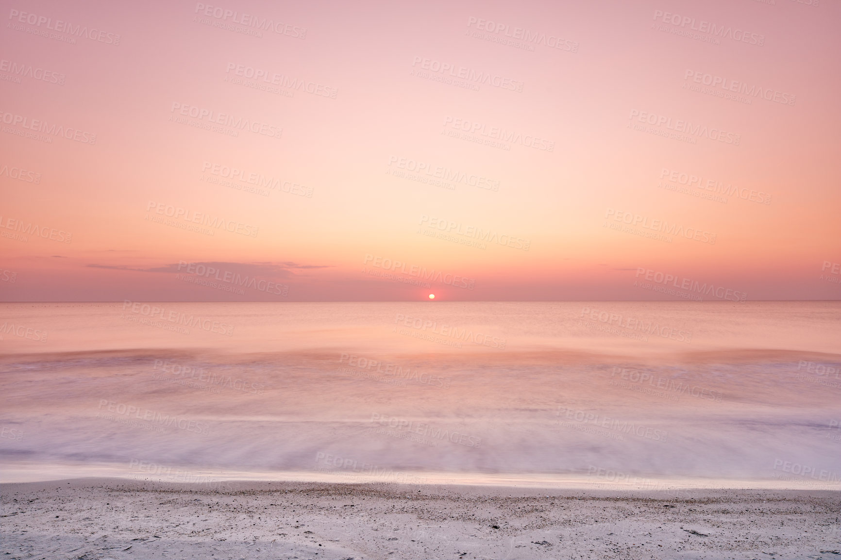 Buy stock photo Beautiful sunset at the beach for a vacation destination. Sunrise with a clear sky and sun rays at the ocean. Coastline landscape with great scenery on a summer day. 