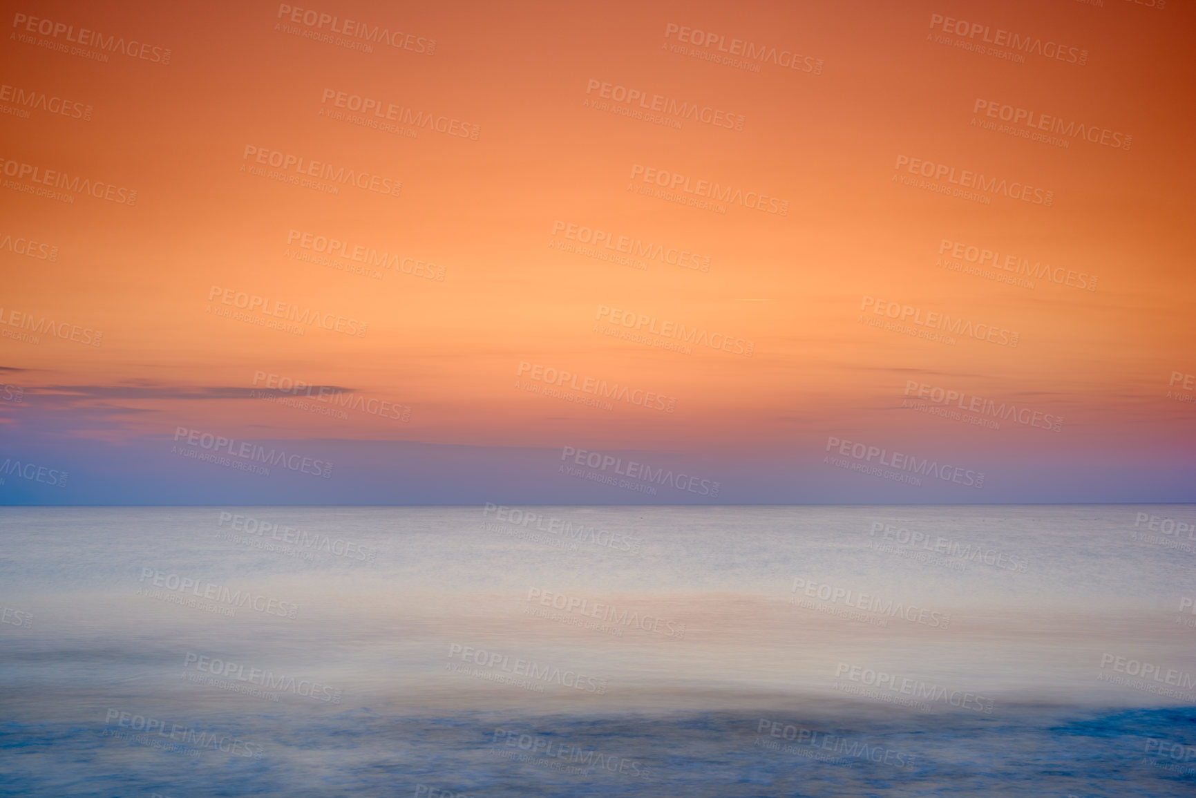 Buy stock photo Copyspace seascape of an orange sunset on the west coast of Jutland in Loekken, Denmark. Sun setting on the horizon on an empty beach at dusk over the ocean and sea at night. Sunrise in the morning