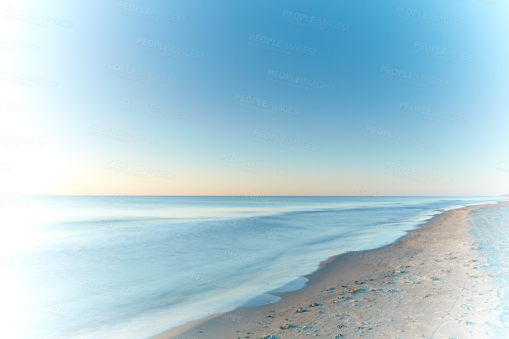 Buy stock photo Copyspace seascape and landscape of a pretty sunset on the westcoast of Jutland in Loekken, Denmark. Beautiful view on an empty beach at dusk. Sun rising over the ocean and sea in the morning