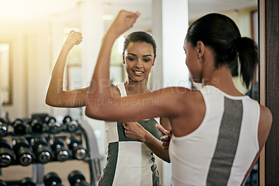 Buy stock photo Woman, strong arm and flex in mirror at gym with fitness, workout and exercise of bodybuilder with reflection. Progress, growth or happy girl athlete with sport training, wellness or bicep muscle