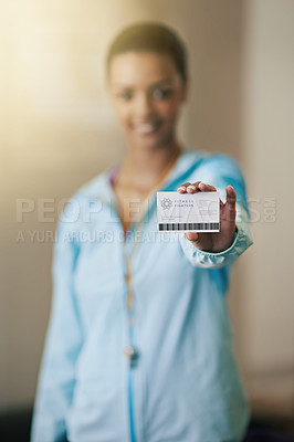 Buy stock photo Shot of a gym trainer showing her identification card