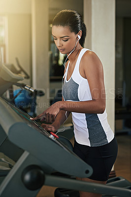 Buy stock photo Black woman, gym and start treadmill for workout to exercise and fitness routine for health. Female person, training and music for wellness, wellbeing and self care with sportswear for hobby