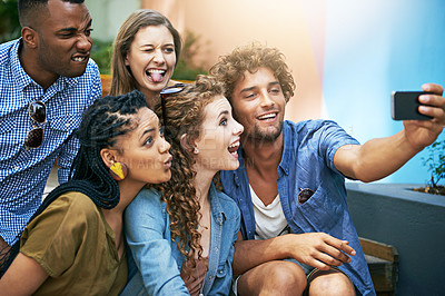 Buy stock photo Funny, face and group of students for selfie at university campus for profile picture update or social media post. Men, women and happy friends with technology for memory, diversity and college fun