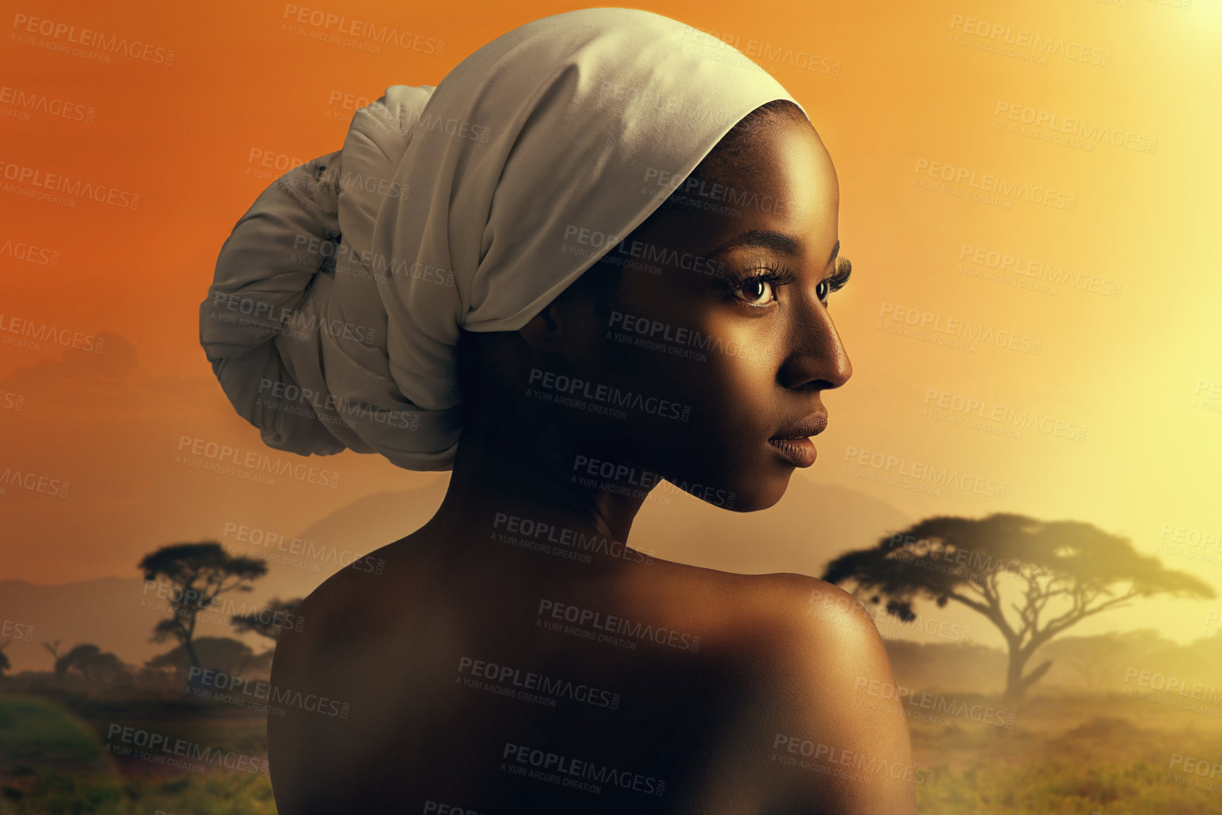 Buy stock photo Cropped shot of a beautiful woman standing against the backdrop of an african sunset