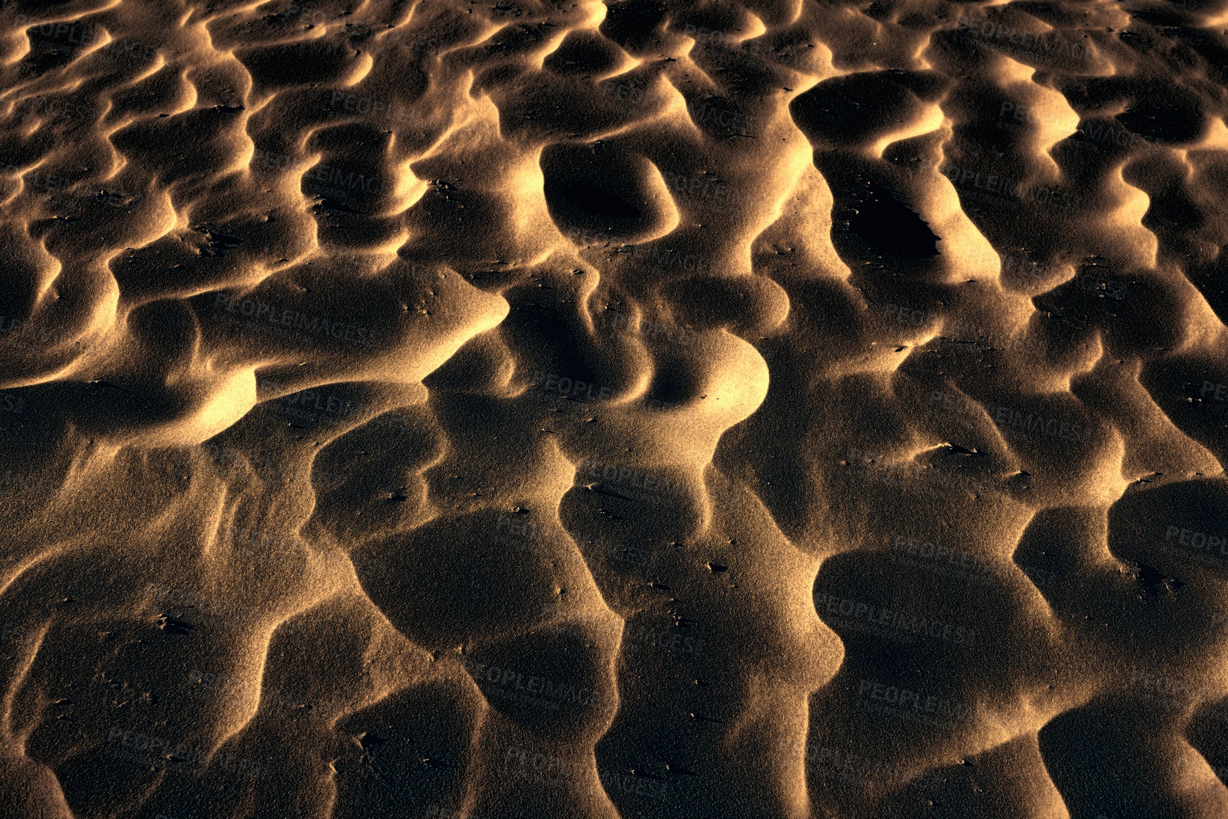 Buy stock photo Beach, sand and pattern in nature with ripple, earth and outdoor with wind, flow and waves with shadow. Ground, soil and dirt with texture, environment and seashore with surface in New Zealand