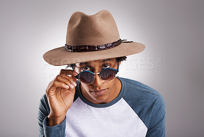 Buy stock photo Black man, hat or glasses in vacation, fashion or portrait of confidence on grey studio background. African male person, fedora or eyewear in funky, cool or hip urban apparel as trendy retro style