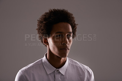 Buy stock photo Serious, thinking and man in studio with ideas for project and dark background with mock up space. Creative, person and planning a decision or choice in fashion with college student on backdrop