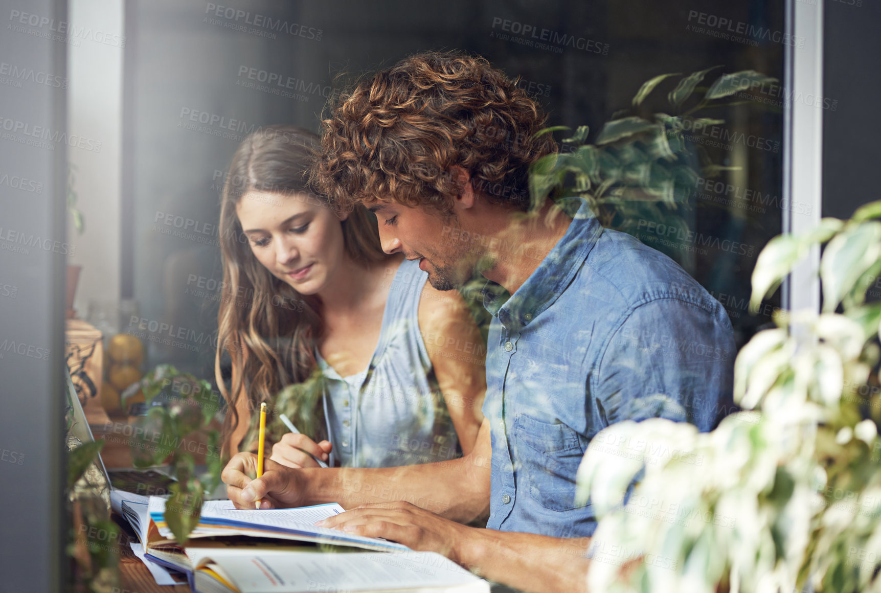 Buy stock photo Man, woman and research for writing, education and tutor in cafe in urban indoor bistro. Couple, journalist and copywriter for window, college and reading for knowledge and love for date together