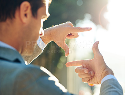 Buy stock photo Hand, frame and business man in city for vision, focus and thinking with mockup. Inspiration, planning and idea with male employee and finger gesture in outdoors for freedom, motivation and insight 