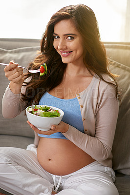 Buy stock photo Smile, eating and pregnant woman with salad on sofa for wellness, diet and health at home. Happy, maternity and female person enjoying food, meal or dinner with vegetables in living room at house.