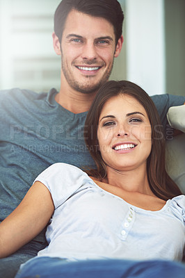 Buy stock photo Happy, relax and portrait of couple on sofa for bonding, relationship and chill together. Love, dating and man and woman embrace, hug and smile on couch for support, care and affection in living room