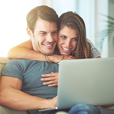 Buy stock photo Laptop, happy and woman embracing man on sofa networking on social media, website or internet. Smile, love and female person hugging husband reading online blog with computer in living room at home.