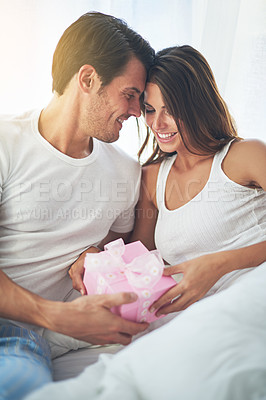 Buy stock photo Man giving woman gift, love and happy with partnership, relationship and celebration on Valentines day date. Couple smile with present, luxury and commitment, gratitude and celebrate holiday