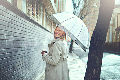 Buy stock photo Woman, umbrella and coffee in street with portrait, smile and walking for commute in winter in city. Person, trench coat and outdoor for fashion on metro road with coco, tea cup or happy in Cape Town