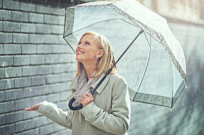 Buy stock photo Rain umbrella, city street and woman smile with happiness on a sidewalk from winter weather. Happy female person, raining and travel on a urban road in New York on holiday with freedom and joy