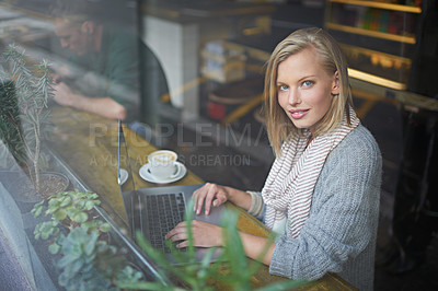 Buy stock photo Coffee shop, laptop and portrait of woman typing in restaurant online for internet, website and research. Happy, relax and girl on computer for freelance career, remote work and email with cappuccino