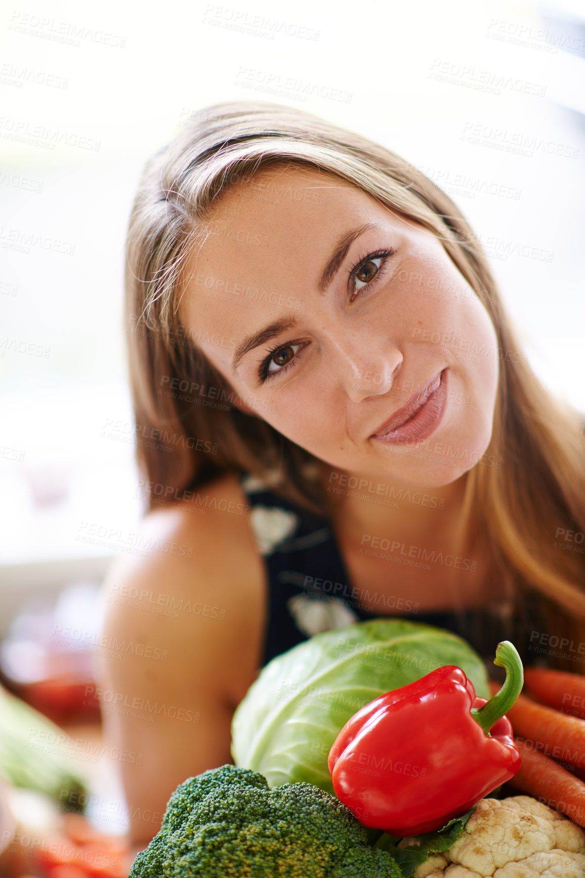 Buy stock photo Woman, pride and portrait with vegetables on kitchen counter for health, nutrition and wellness. Happy, female nutritionist and groceries for detox, vegan and diet in apartment for meal prep