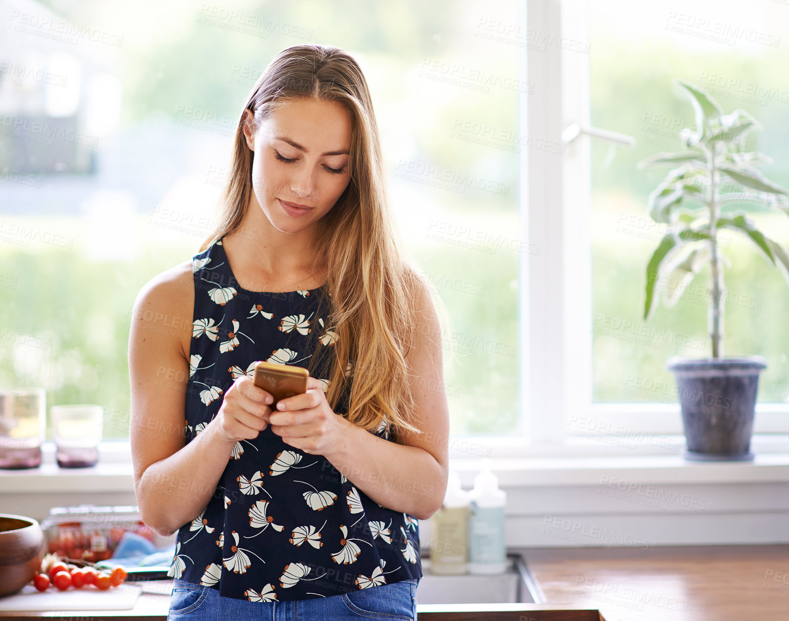 Buy stock photo Woman, kitchen and cooking with cellphone for recipe, online and blog for food preparation. Home, smartphone and read for female person, digital and internet for mobile app on social media in house