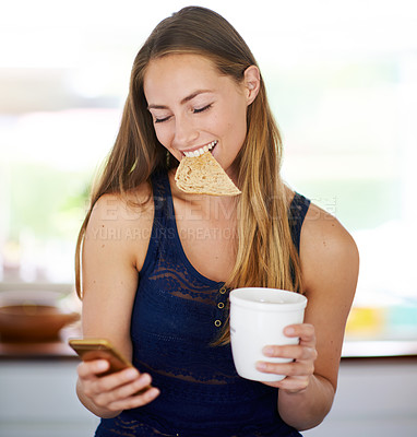 Buy stock photo Woman, cellphone and toast with coffee in morning, breakfast and nutrition with news. Technology, food and current affairs online on smartphone, social media and female person in home kitchen