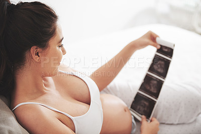 Buy stock photo Pregnant woman, sonogram and ultrasound with home, bedroom and relaxing mom. Mother, maternity and motherhood with fetus development with care, love and sonar scan with house comfort for expectation