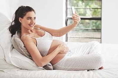 Buy stock photo Pregnant woman, phone selfie or video call in house bedroom for communication or online consultation. Smile, mom or happy mother on mobile app for gynecology telehealth, pregnancy update or maternity